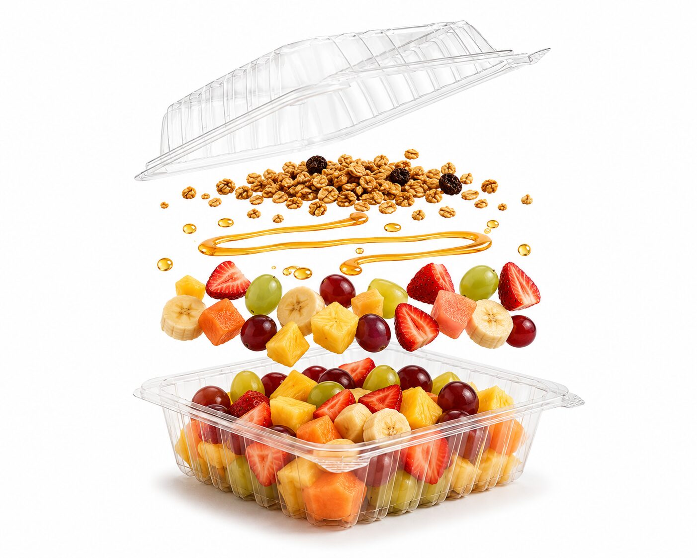 Charola transparente con fruta fresca, miel y granola mostrando ingredientes flotando y tapa abierta sobre fondo blanco.